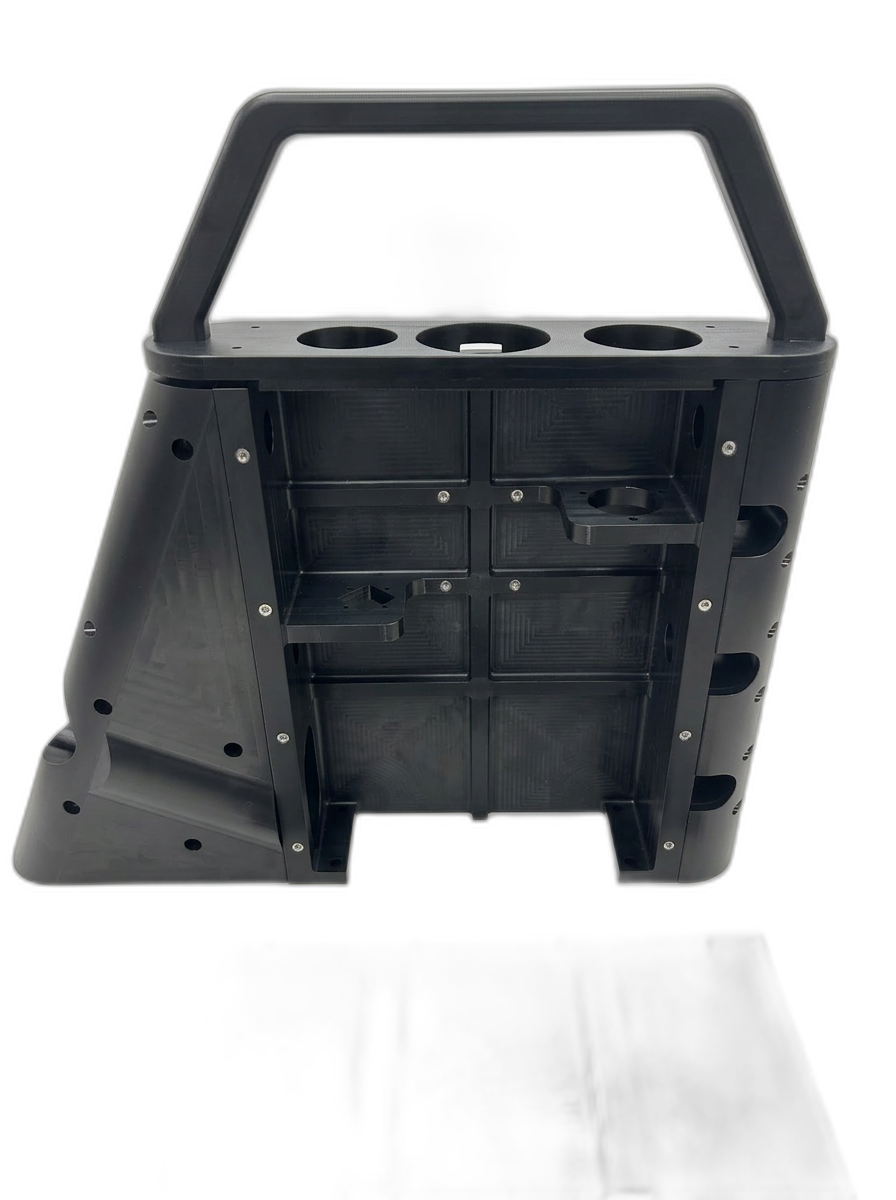 Large black machined plastic enclosure with carry handle and removable base plate